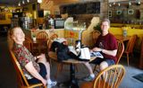 Susie and Steve lounging in the coffee shop to beat the heat.